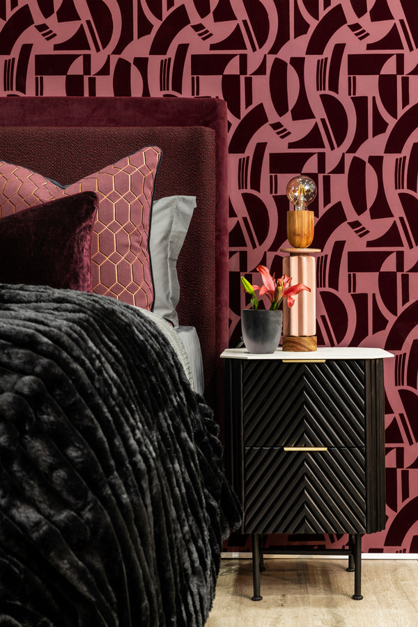 Burgundy textured wallpaper styled in  bedroom designed by Giava Interiors oin South Africa