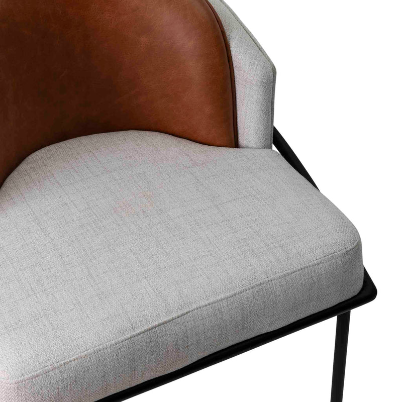 Seat detail of the double back fabric and genuine leather combination dining chair by Giava Interiors, South Africa
