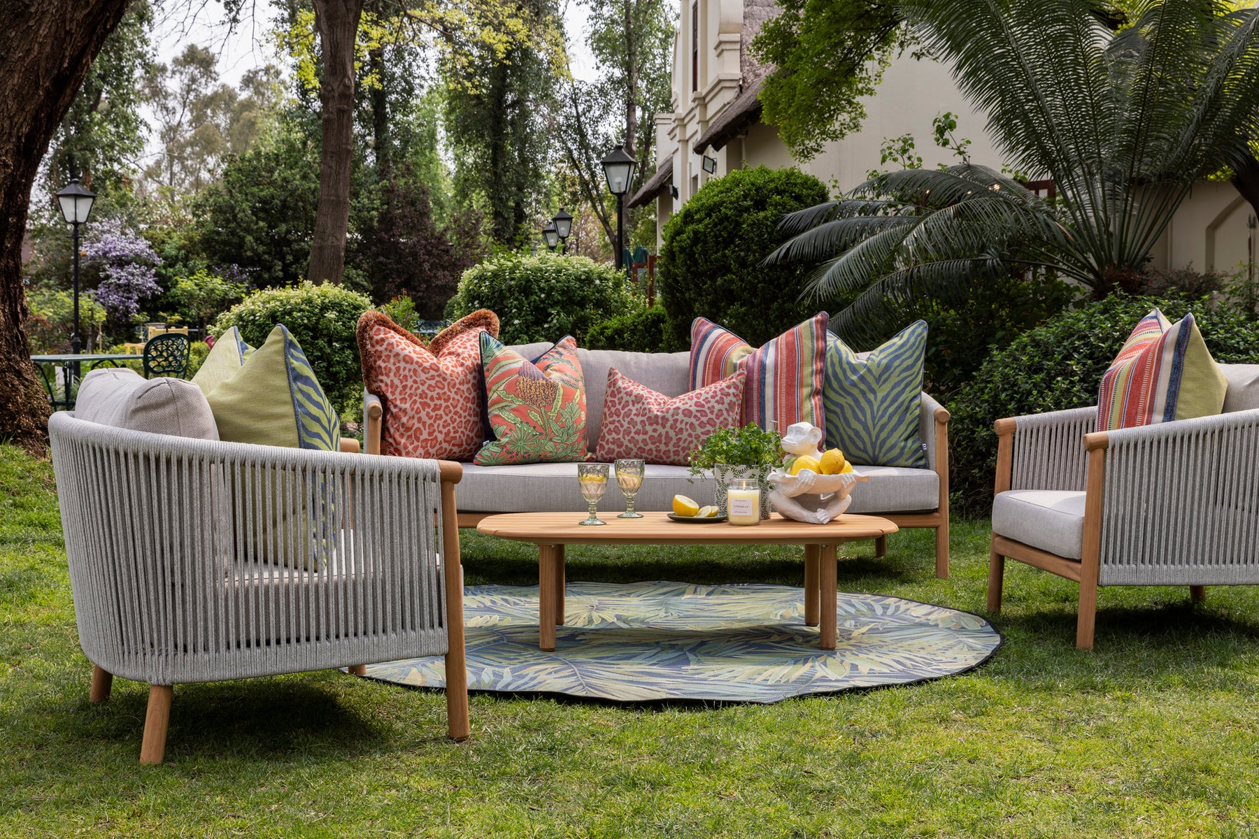 Outdoor furniture with scatter cushions in multicolours by Giava Interiors. Made in South Africa