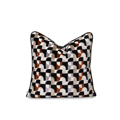 Mobel scatter cushion with geometric patterns in black, white, and earthy tones, perfect for adding style to any space.