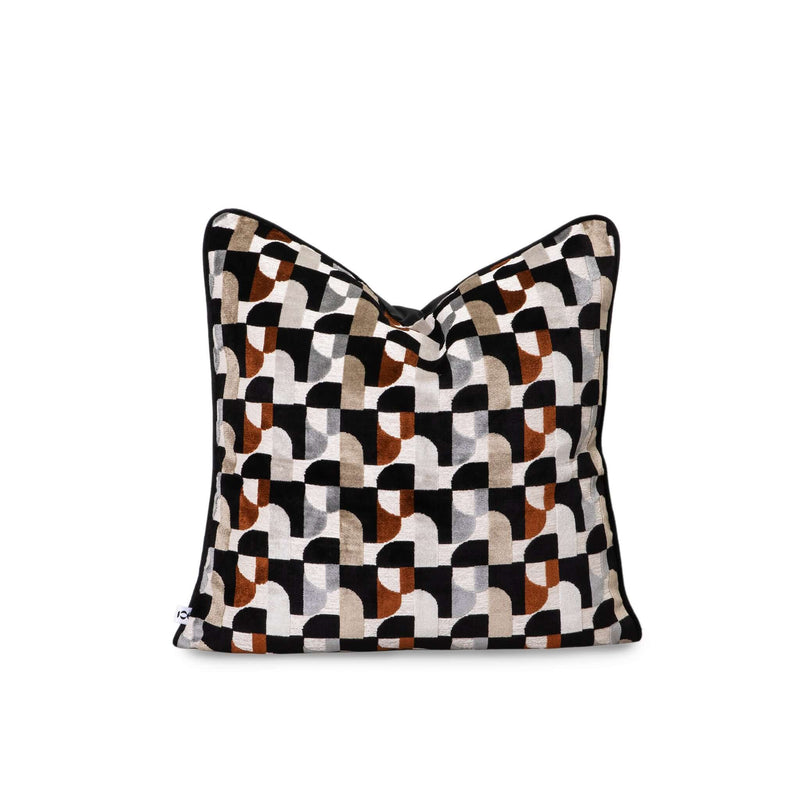 Mobel scatter cushion with geometric patterns in black, white, and earthy tones, perfect for adding style to any space.