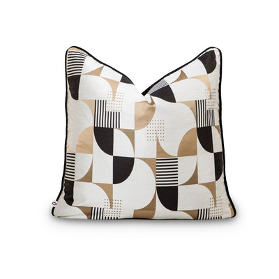Geometric scatter cushion cover in black, beige, and golden tones by Giava Interiors