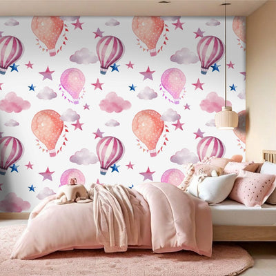 Children's bedroom with colorful wall mural featuring hot air balloons and stars by Giava Interiors, South Africa