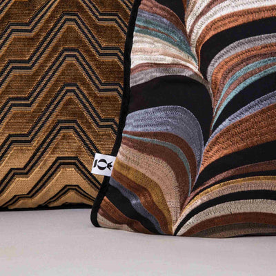 Copper and blue tones embroidered scatter cushions by Giava Interiors. Made in South Africa