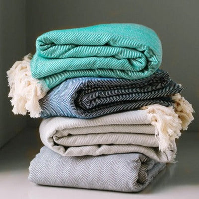 Selection of herringbone throws by Giava Interiors made in South Africa