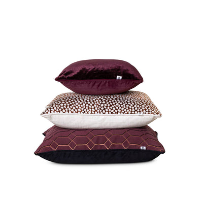 Stack image of the maroon scatter set by Giava Interiors. Made in South Africa