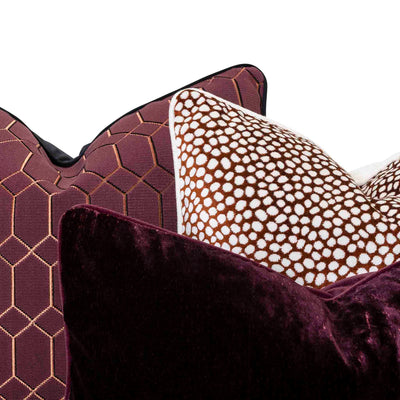 Close up of our wine red maroon scatter set by Giava Interiors. Made in South Africa