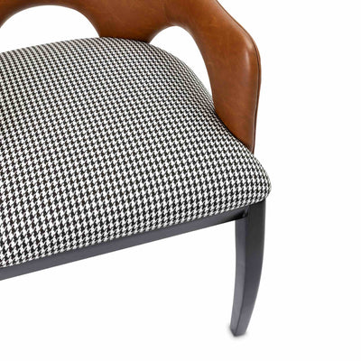 Close-up of the Houndstooth and faux leather dining chair by Giava Interiors. Made in South Africa