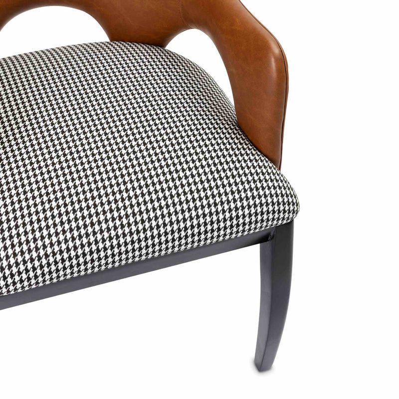 Close-up of the Houndstooth and faux leather dining chair by Giava Interiors. Made in South Africa