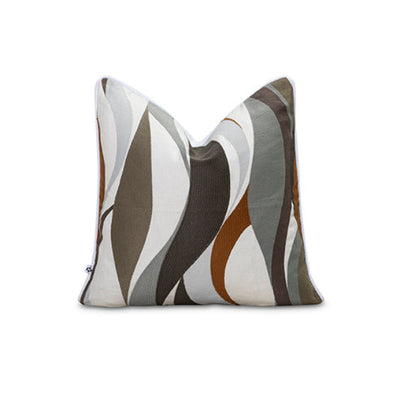 Flame-pattern embroidery in naturals.Cushion cover by Giava Interiors made in South Africa. 