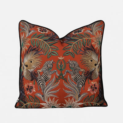 Animal print embroidered on a bright orange scatter by Giava Interiors made in South Africa